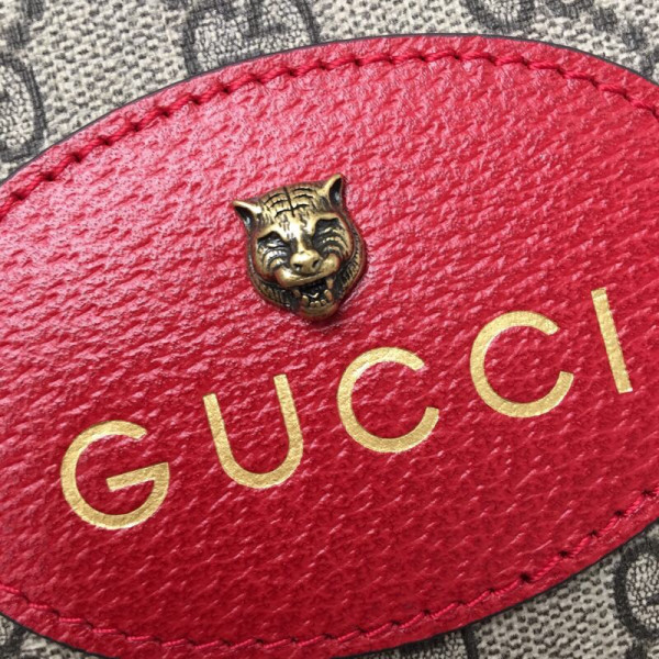 G*u*i gg messenger bag