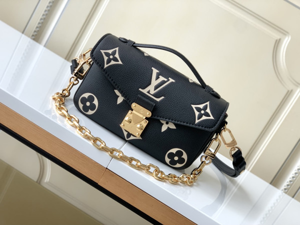 l**is V*t*n pochette metis east west